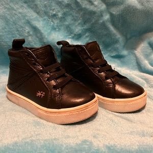 Freshly picked black leather shoes